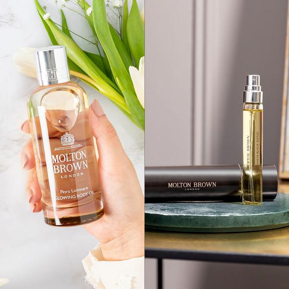 An image of Molton Brown Flora Luminare Body Oil and Travel Fragrance