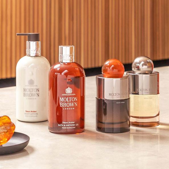 An Image of Molton Brown Ambery Collection of Body Lotion, Shower Gel, Eau De Parfum & Eau De Toilette