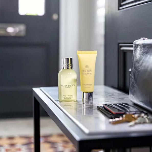 An Image of Orange & Bergamot Molton Brown Hand Cream & Molton Brown Hand Sanitiser