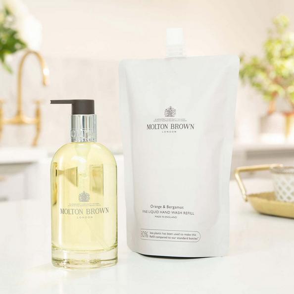Molton Brown refillable glass bottle and Orange & Bergamot Fine Liquid Hand Wash refill