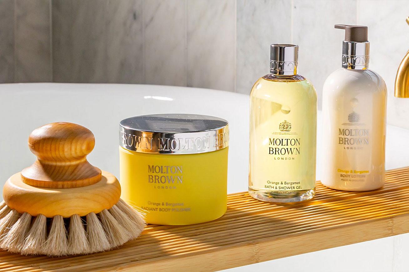 An image of Molton Brown products on a bath tray