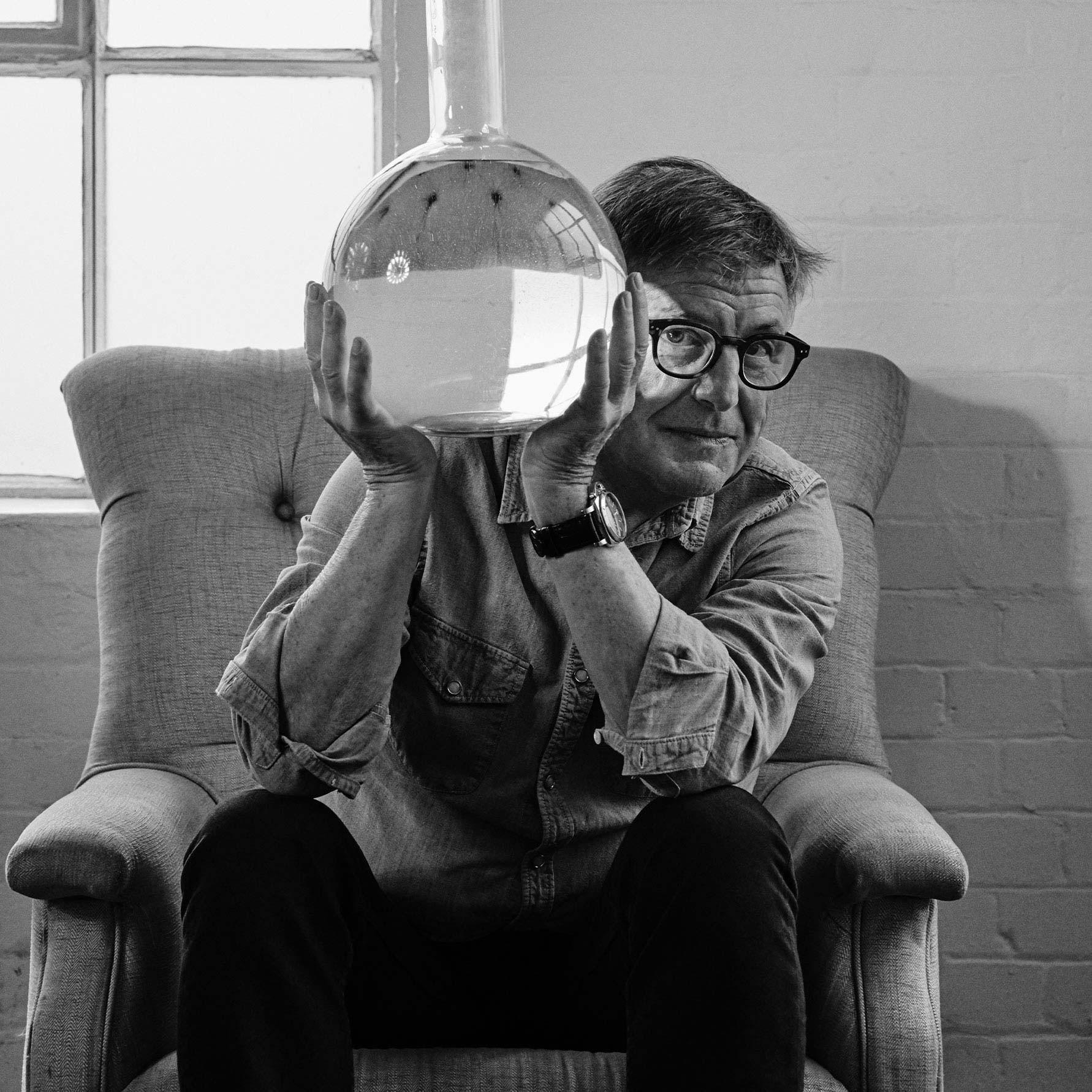 An image of Jacques Chabert holding up a Fragrance Sculpture