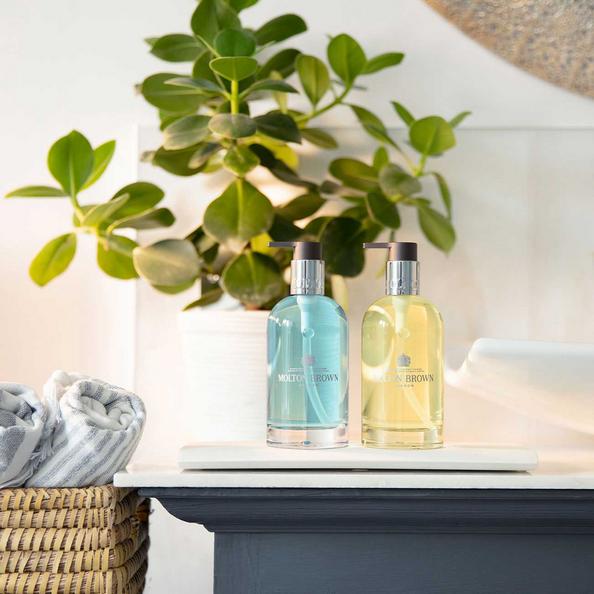 Molton Brown Refillable Glass Bottles on display