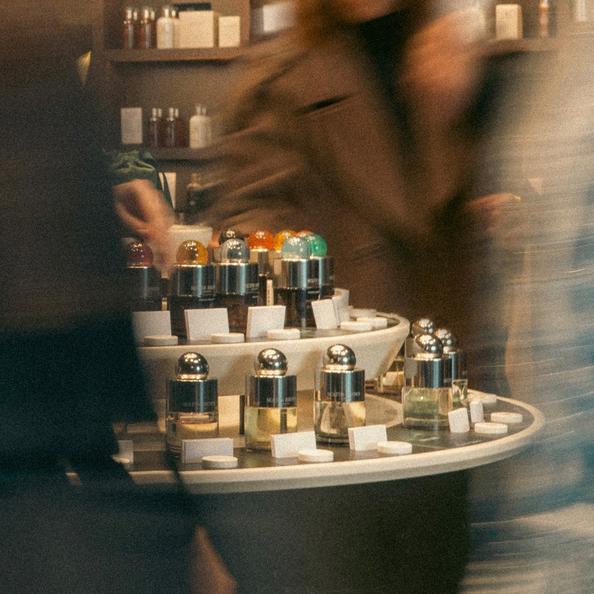 An Image of a customer choosing a hand massage fragrance