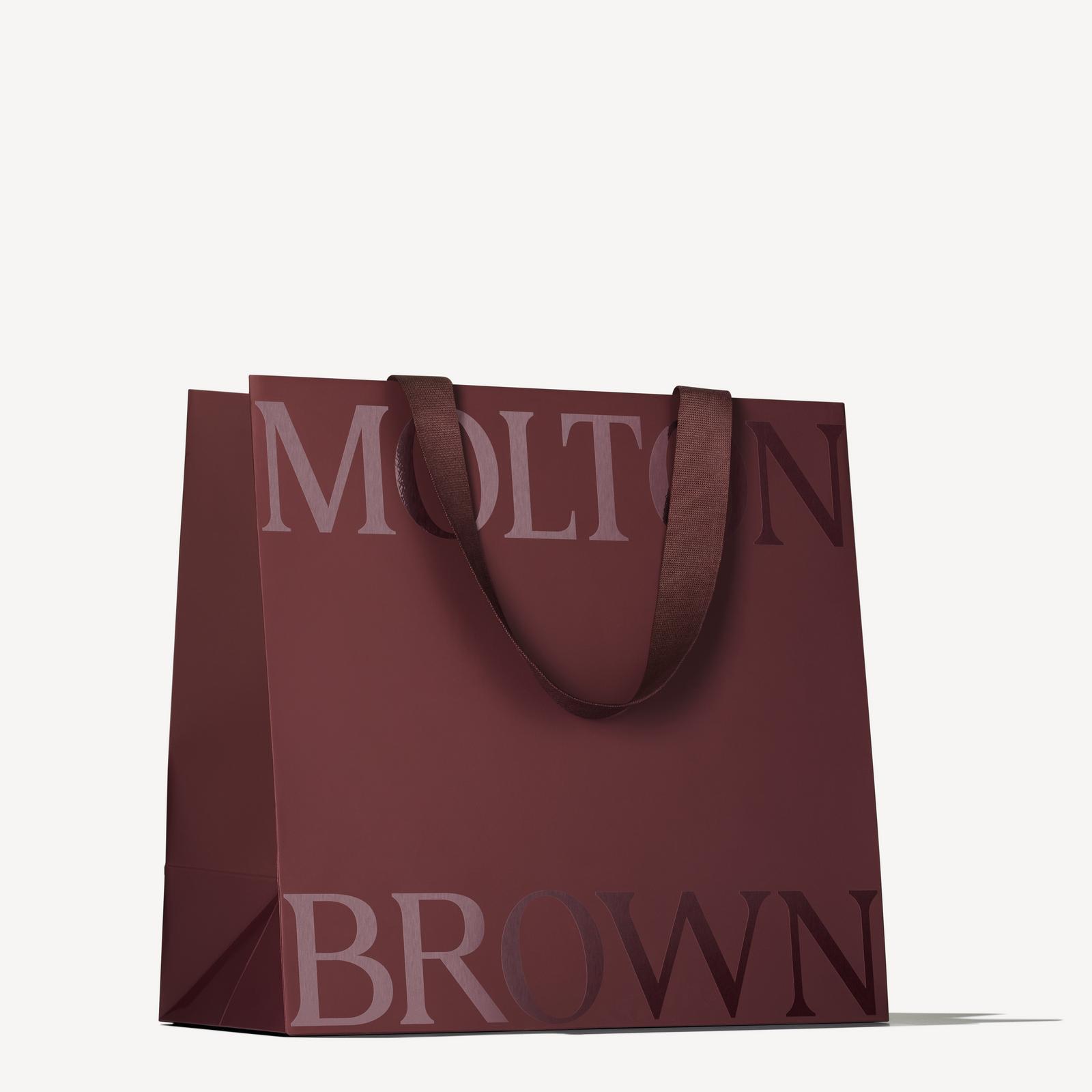 The Molton Brown carrier bag the calendar ships in